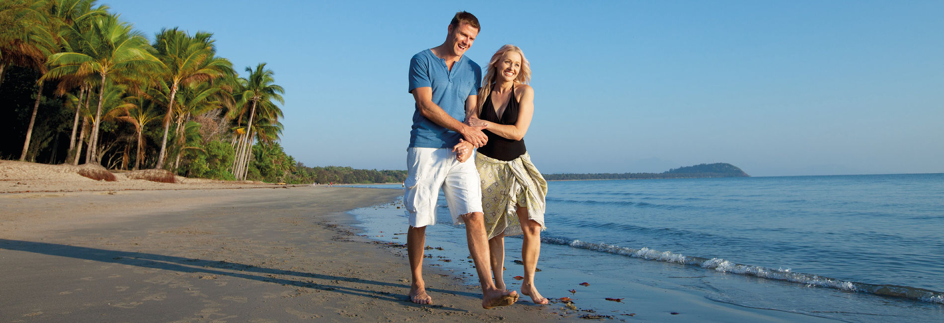 Beautiful Four Mile Beach Just 100m Away Couple walking along the foreshore of Four Mile Beach, located 100 metres from Mowbray by the Sea
